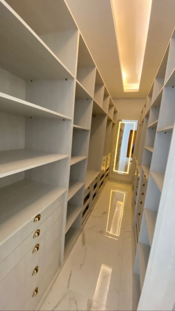 walk-in closet designers in Kenya, modern walk-in closet designs, luxury closet interior design Kenya, bedroom closet design Kenya, custom closets in Kenya, space-saving walk-in closets, walk-in closet installation Kenya, affordable walk-in closets Kenya, closet designers Nairobi, closet interior design Mombasa