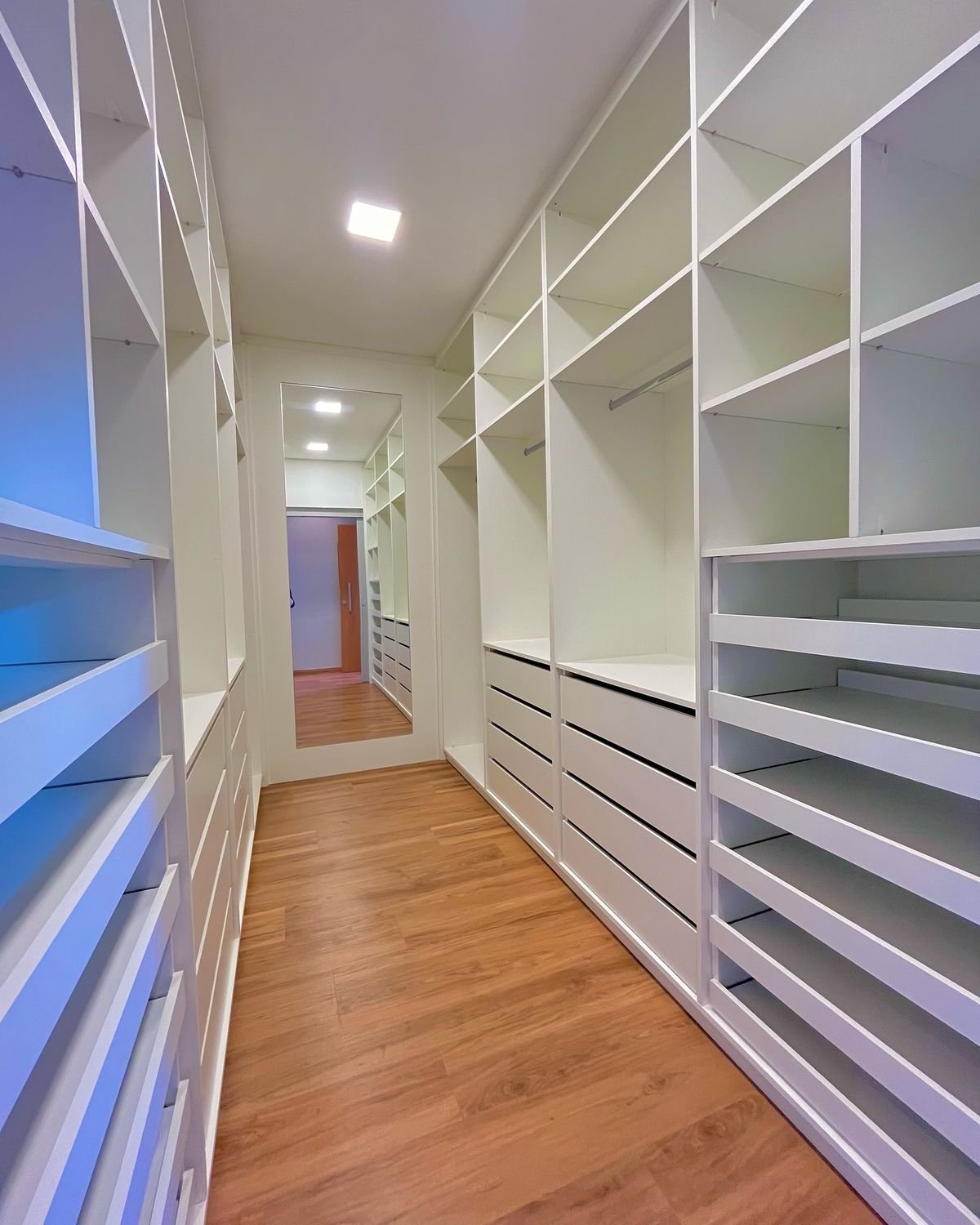 modern walk-in closet designs, custom walk-in closets, bedroom closet designs, luxury walk-in wardrobes, closet installation in Kenya, closet interior design, modern wardrobe designs, walk-in closet Kenya, small space closet solutions, suitable homes interior design