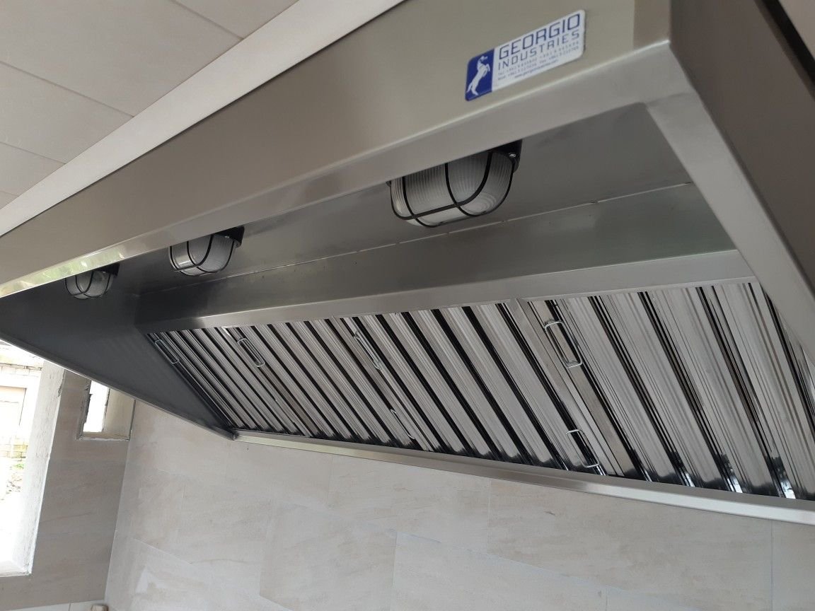 Commercial wall-mount hoods Kenya, wall-mount kitchen exhaust Nairobi, stainless steel wall hoods, restaurant wall-mount ventilation hoods, commercial kitchen hoods Kenya, kitchen exhaust systems, industrial kitchen wall-mount hoods.
